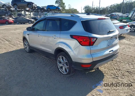 2019 Ford Escape Titanium z USA, uszkodzony, nr VIN 1FMCU0J90KUA50497